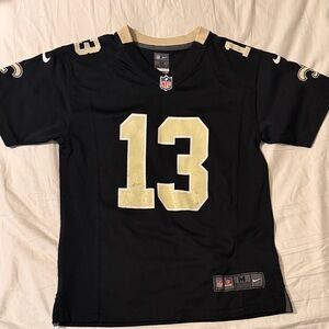 Nike Kids Black and Gold Jersey